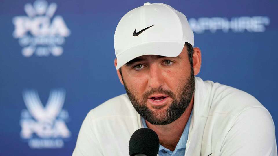 FILE - Scottie Scheffler speaks during a news conference after the second round of the PGA Championship golf tournament at the Valhalla Golf Club, Friday, May 17, 2024, in Louisville, Ky. Criminal charges against Scheffler have been dismissed, ending a legal saga that began with images of the world's top male golfer being arrested and handcuffed in Louisville during the PGA Championship.