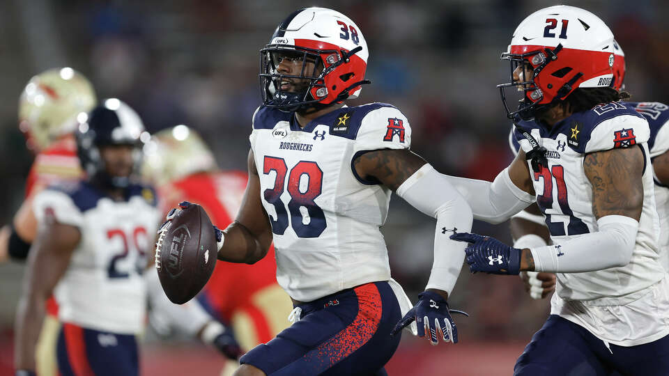 BIRMINGHAM, ALABAMA - MAY 18: Donald Rutledge Jr. #38 of the Houston Roughnecks celebrates with teammates after intercepting a pass during the second quarter against the Birmingham Stallions at Protective Stadium on May 18, 2024 in Birmingham, Alabama. (Photo by Stew Milne/UFL/Getty Images)