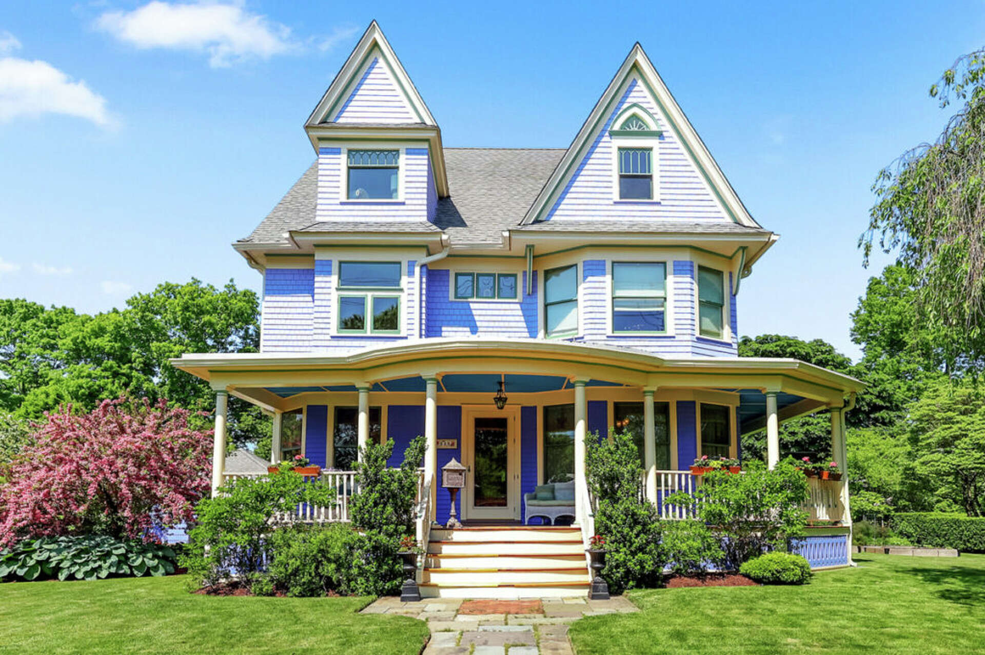 Purple Victorian in CT with stained-glass windows listed for $1.2M, image size:1920x1277