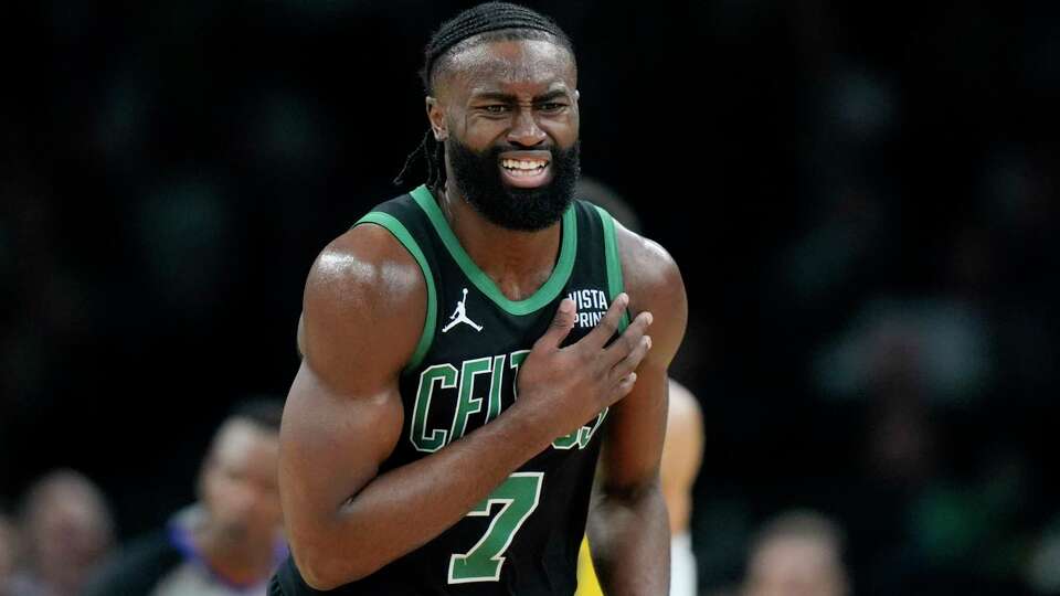 Boston Celtics guard Jaylen Brown (7) reacts on the court during the first half of Game 2 of the NBA Eastern Conference basketball finals against the Indiana Pacers, Thursday, May 23, 2024, in Boston.