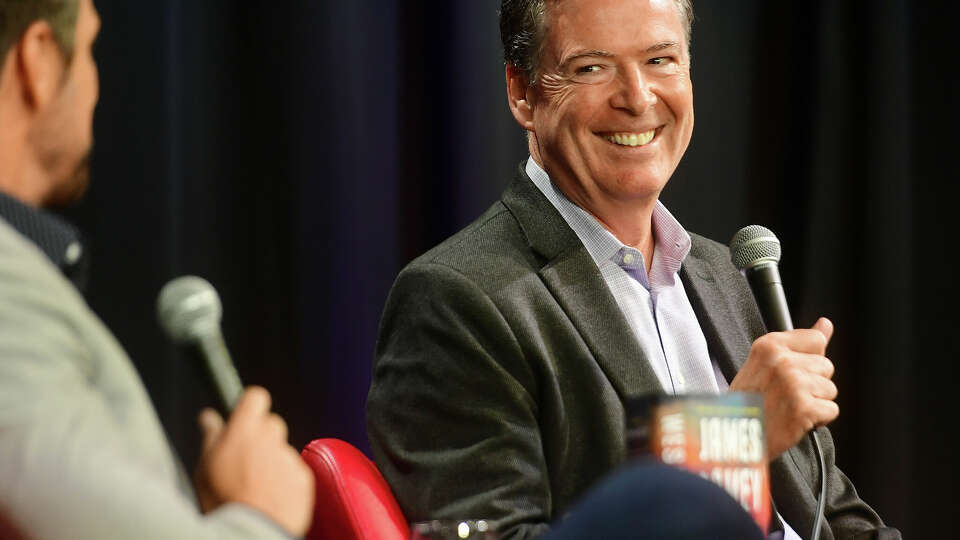 Former FBI director James Comey is interviewed on stage by Dave Bruce about his new crime novel, 'Westport', at the Westport Library on Thursday, May 23, 2024. Comey is a former Westport resident and general counsel for hedge fund Bridgewater Associates.