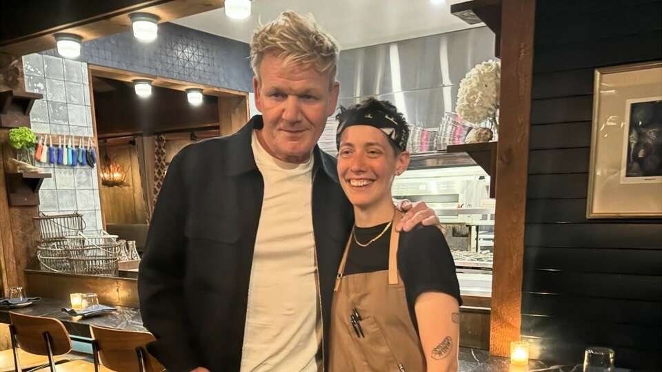 'Hell's Kitchen' host and celebrity chef Gordon Ramsay visited Mystic's Oyster Club recently. He's pictured here with executive chef Renee Touponce, a James Beard Foundation award nominee.