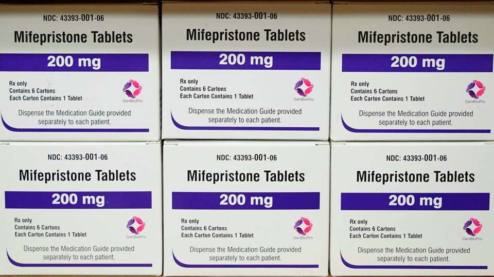 FILE - Boxes of the drug mifepristone sit on a shelf at the West Alabama Women's Center in Tuscaloosa, Ala., on March 16, 2022. Louisiana Gov. Jeff Landry has signed a first-of-its-kind bill Friday, May 24, classifying two abortion-inducing drugs, mifepristone and misoprostol, as controlled and dangerous substances.