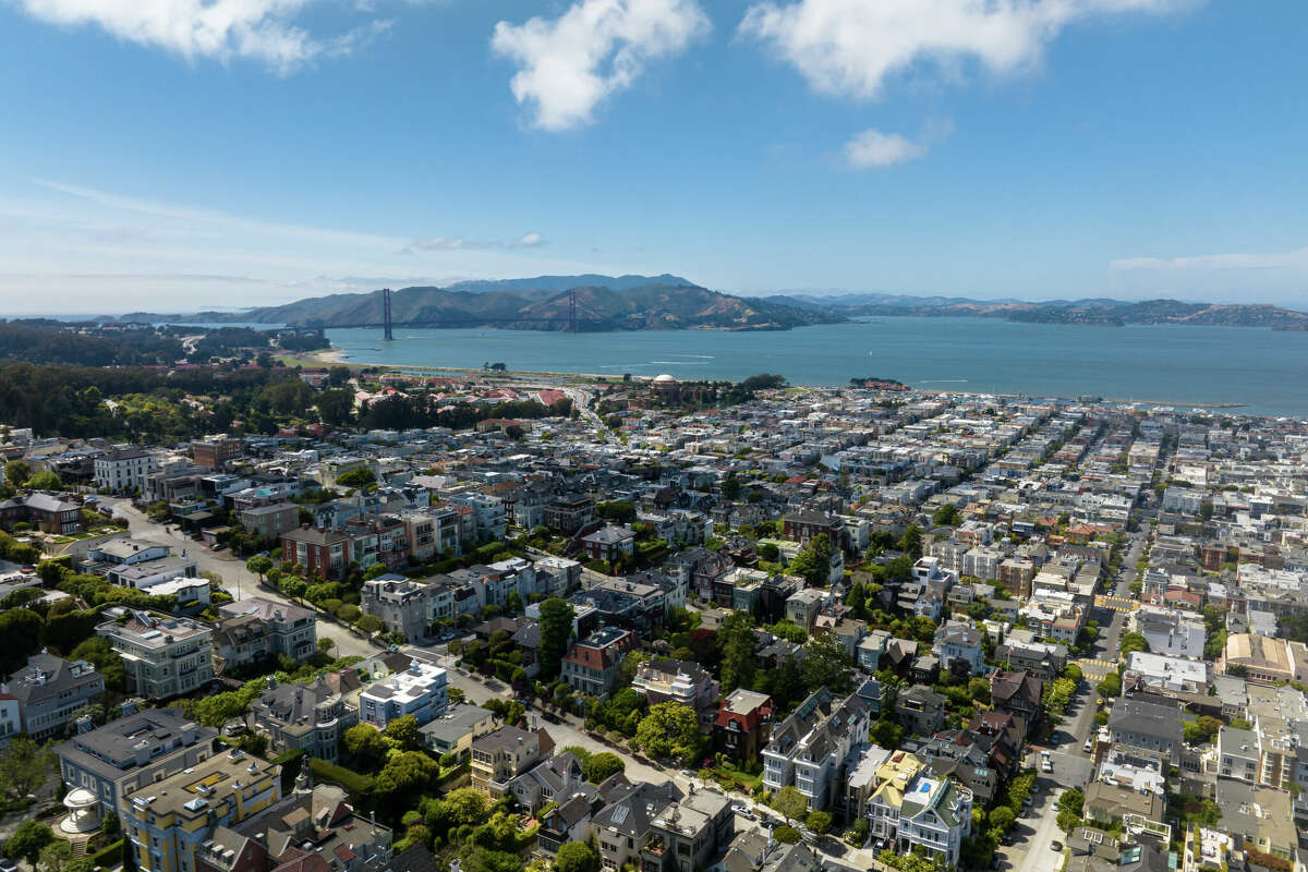 An aerial view of Pacific Heights looking towards the Golden Gate Bridge in San Francisco, California.