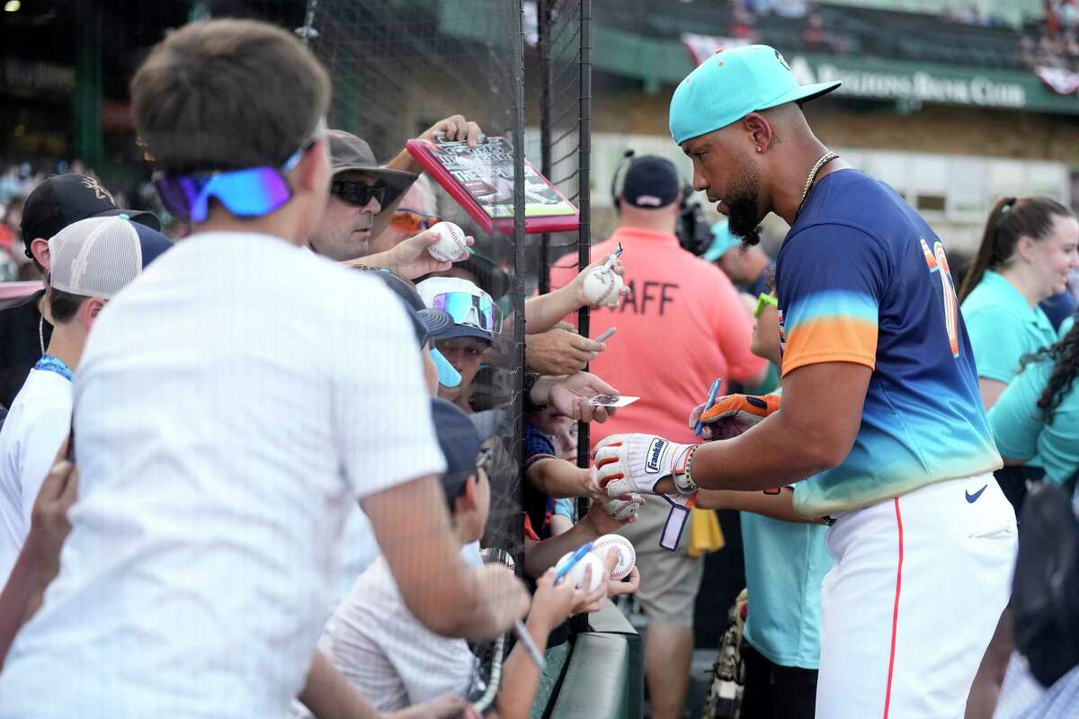 Houston Astros first baseman José Abreu (79) signs autographs before the start of a minor league baseball game at Constellation Field on Saturday, May 25, 2024, in Sugar Land.