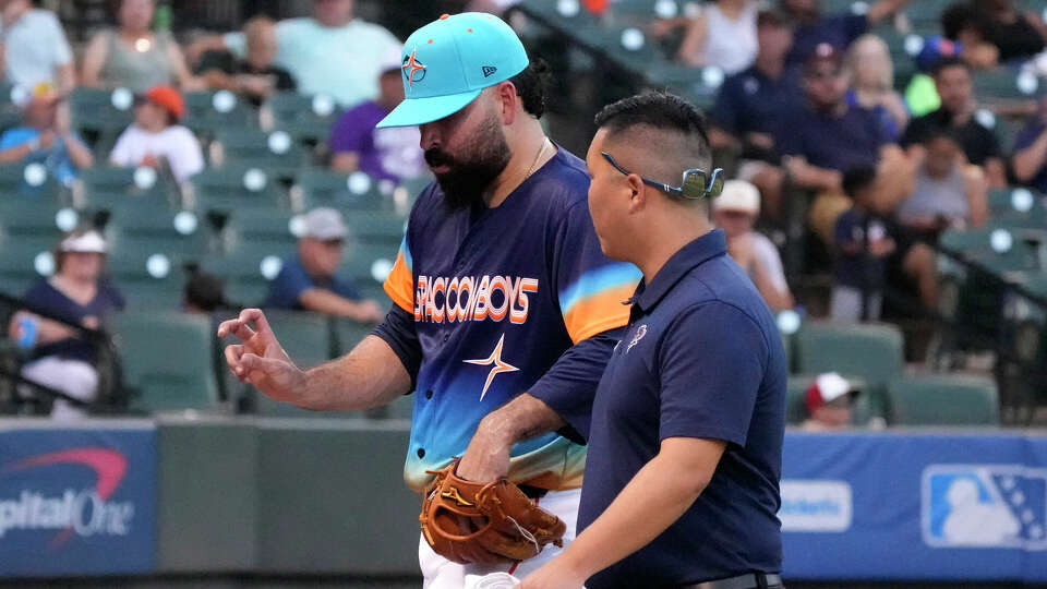 Houston Astros starting pitcher Jose Urquidy (65) comes out of the game flexing his right arm during the fourth inning of his minor league rehab game at Constellation Field on Saturday, May 25, 2024, in Sugar Land. He left the game after throwing one test pitch with right forearm discomfort. He had thrown 52 pitches.