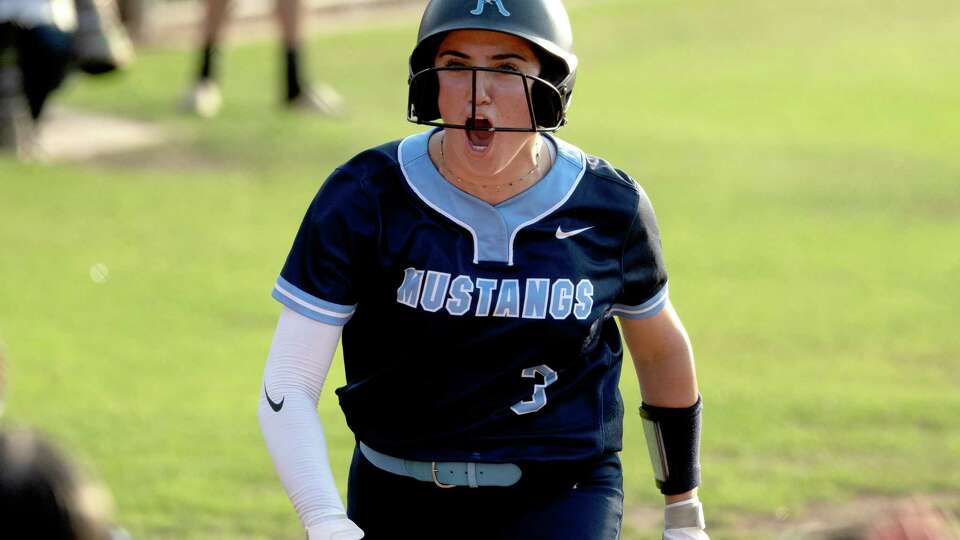 Kingwood's Mia Gagliardi reacts after hitting the second of back-to-back home runs off Katy starting pitcher Ella Kate Smith in the first inning during Game 2 of the Region III-6A final high school softball series at Katy High School, Friday, May 24, 2024, in Katy.