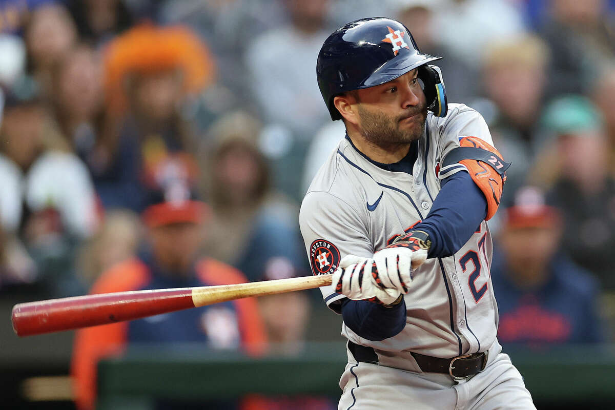 Jose Altuve #27 of the Houston Astros hits a double against the Seattle Mariners during the fifth inning at T-Mobile Park on May 27, 2024 in Seattle, Washington.