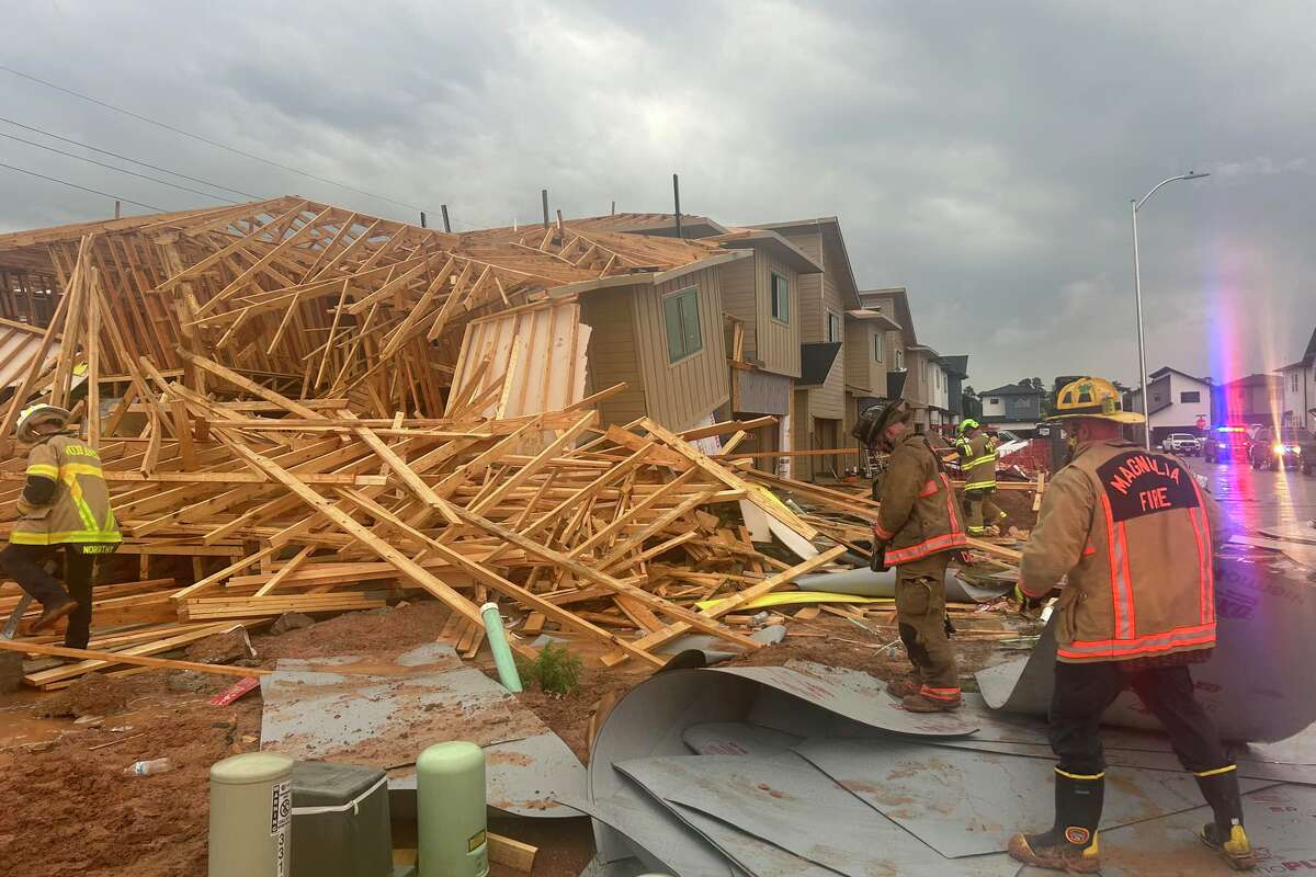 Magnolia firefighters were joined by first responders from nearby departments to respond to a fatal building collapse caused by storms moving across Southeast Texas on Tuesday.