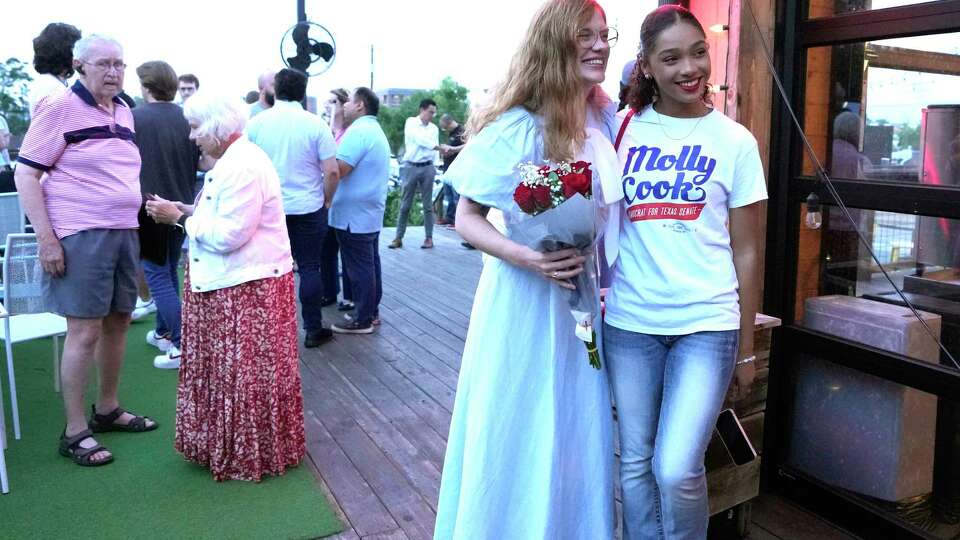 Molly Cook takes a photo with Ashlyn Morton, 17, during her watch party at Patterson Park on Tuesday, May 28, 2024, in Houston.