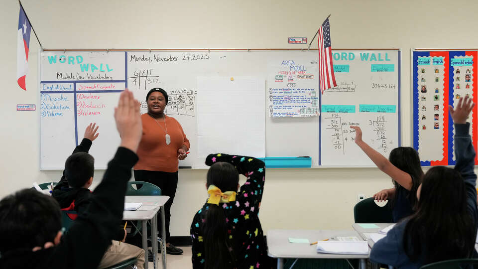 A dual language program teacher is teaching fourth grade science on Monday, Nov. 27, 2023 at Gregg Elementary School in Houston.