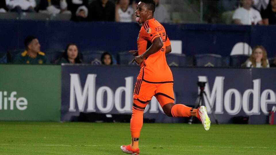 Houston Dynamo forward Latif Blessing celebrates his goal during the first half of a Major League Soccer match against the LA Galaxy on Saturday, May 25, 2024, in Carson, Calif. (AP Photo/Mark J. Terrill)