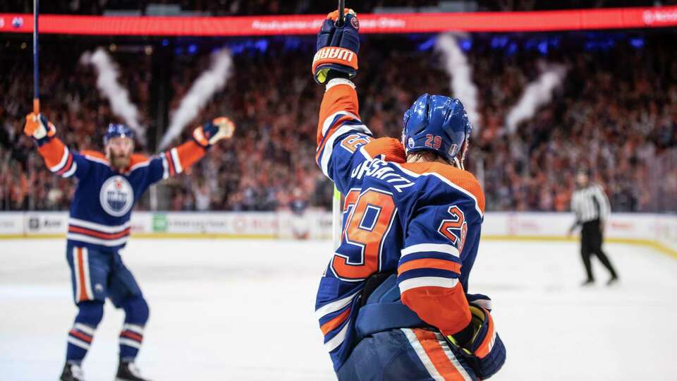 Edmonton Oilers' Leon Draisaitl (29) celebrates a goal against the Dallas Stars during the second period of Game 4 of the Western Conference final in the NHL hockey Stanley Cup playoffs, Wednesday, May 29, 2024, in Edmonton, Alberta. (Jason Franson/The Canadian Press via AP)