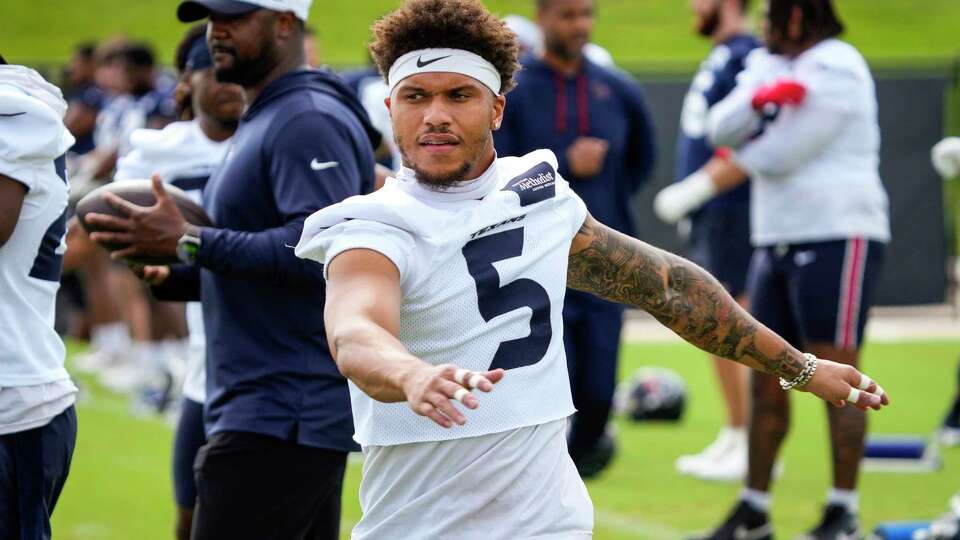 Houston Texans safety Jalen Pitre warms up during an NFL football OTA practice on Thursday, May 30, 2024, at Houston Methodist Training Center in Houston.