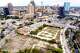 Mostly vacant property near the northern end of the San Pedro Creek Cultural Park, seen in a Nov. 2, 2022 aerial image, tops the short list of locations for a downtown baseball field to replace the Missions’ aging Wolff Stadium. Much of the property is already owned by Weston Urban, a real estate firm co-founded by Backspace co-founder Graham Weston who is part of an investment group rumored to be buying the Double-A minor league team.