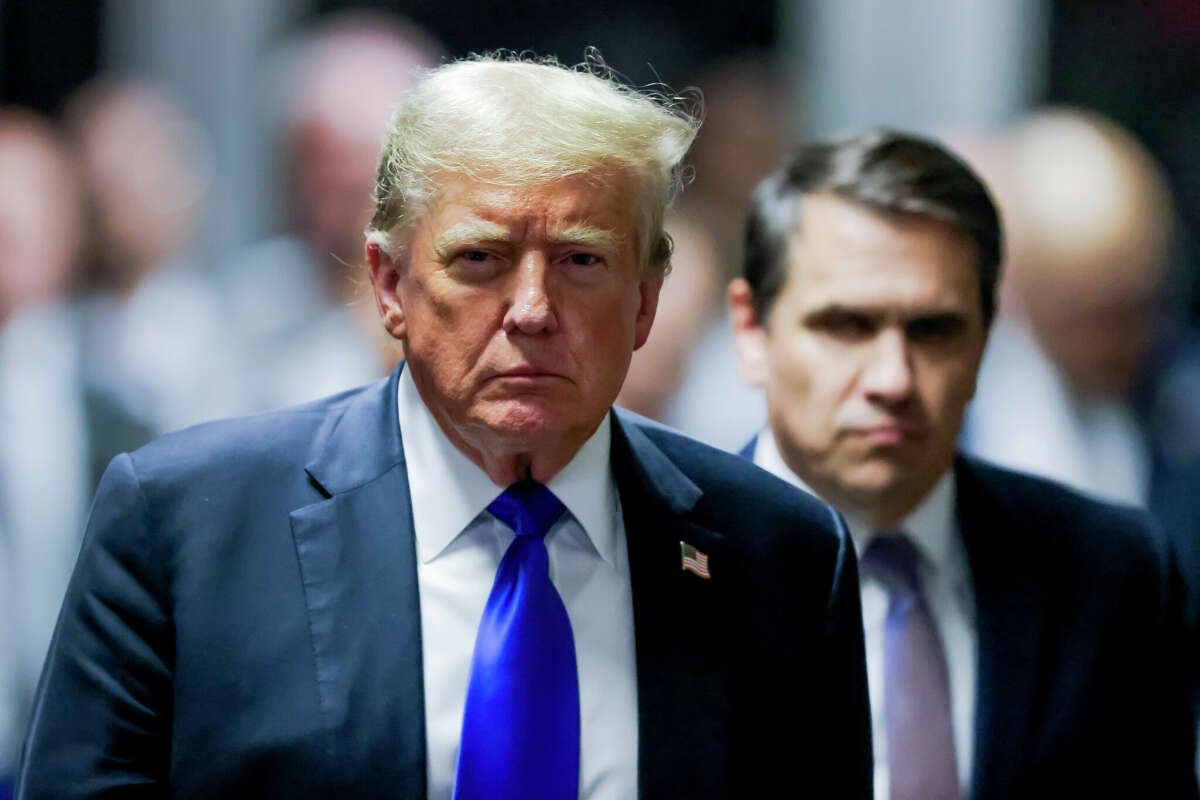 NEW YORK, NEW YORK - MAY 30: Former U.S. President Donald Trump departs the courtroom after being found guilty on all 34 counts in his hush money trial at Manhattan Criminal Court on May 30, 2024 in New York City. 