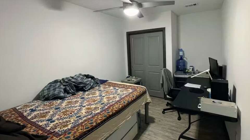 Thousands of windowless apartment rooms like this one have been built near the University of Texas at Austin.