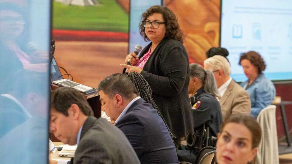 HISD senior staff members sit adjacent to Imelda delaGuardia, HISD south division superintendent, as she speaks to Community Advisory Board members regarding a multi billion dollar bond package during a meeting in the south HISD division Thursday, May 30, 2024 at Cornelius Elementary School in Houston.