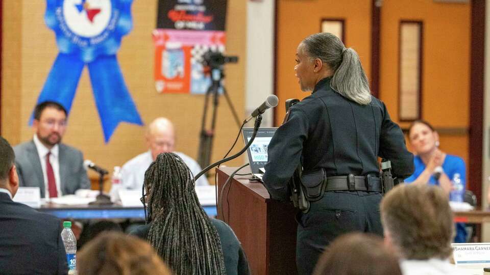 HISD senior staff members sit adjacent to HISD Chief of Police Shamara Garner, as she speaks to Community Advisory Board members regarding a multi billion dollar bond package during a meeting in the south HISD division Thursday, May 30, 2024 at Cornelius Elementary School in Houston.