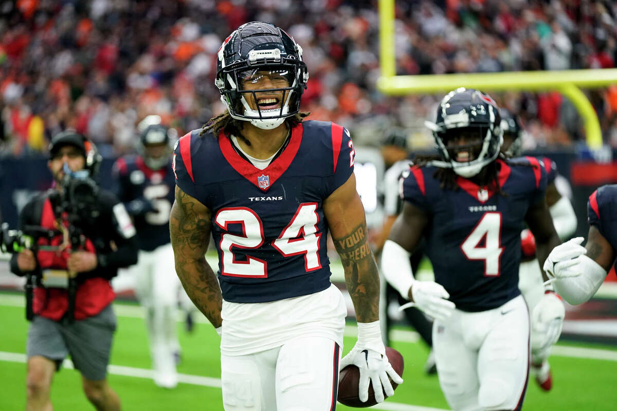 Derek Stingley Jr. #24 of the Houston Texans celebrates after making an interception in the fourth quarter against the Denver Broncos at NRG Stadium on December 03, 2023 in Houston, Texas. 