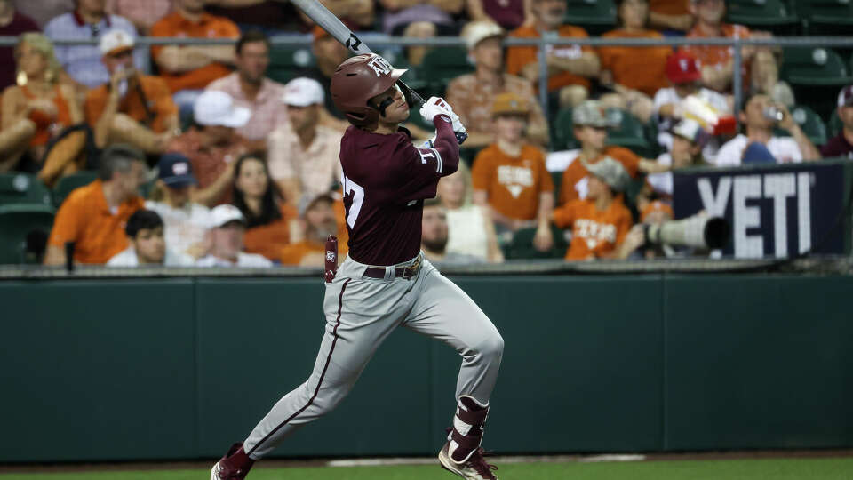 AUSTIN, TX - MARCH 05: Texas A&M infielder Ted Burton (27) watches his hit as he takes off for first base during the college baseball game between Texas Longhorns and Texas A&M Aggies on March 5, 2024, at UFCU Disch-Falk Field in Austin, TX. (Photo by David Buono/Icon Sportswire via Getty Images)