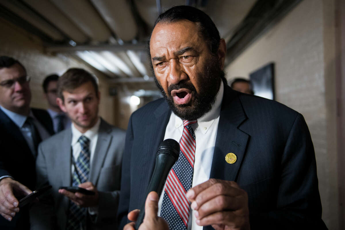 Rep. Al Green, D-Texas, talks with reporters after a meeting of House Democrats in the Capitol on Wednesday, July 17, 2019.