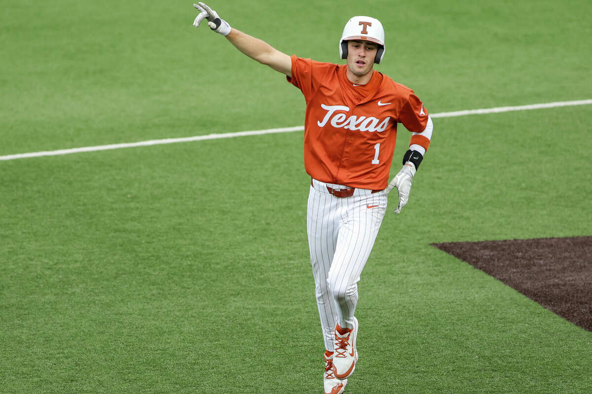 Jalin Flores hit a grand slam to lead the Longhorns past the Ragin' Cajuns on Friday in an NCAA Tournament regional game.