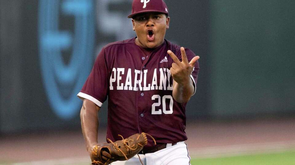 Pearland starting pitcher Jaden Barfield (20) reacts after striking out Cy-Fair's Dylan Rostron to end the fourth inning of Game 2 during a Region III-6A championship series at Constellation Field, Friday, May 31, 2024, in Houston.