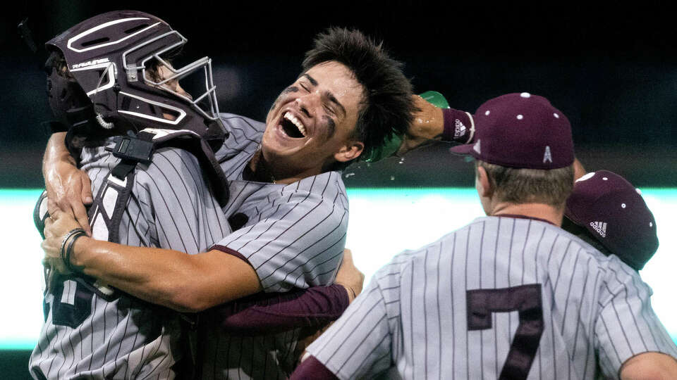 Pearland starting pitcher Nico Partida, right, embraces catcher Isaiah Castaneda reacts after striking out Cy-Fair's Bo Caraway for the final out of the seventh inning to take a 5-1 win in Game 3 during a Region III-6A championship series at Constellation Field, Saturday, June 1, 2024, in Houston. Pearland advanced to next week's UIL State Baseball Tournament.