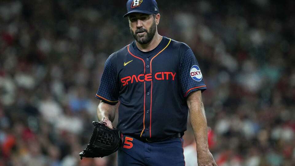 Houston Astros starting pitcher Justin Verlander (35) walks back to the dugout after closing out the top of the third inning of an MLB game Monday, June 3, 2024, at Minute Maid Park in Houston.