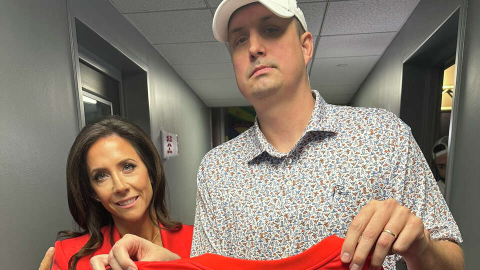 Landry Locker, pictured with Houston Texans Foundation vice president Hannah McNair earlier this year, announced his departure from Sports Radio 610's mid-day show to focus on his streaming channel.