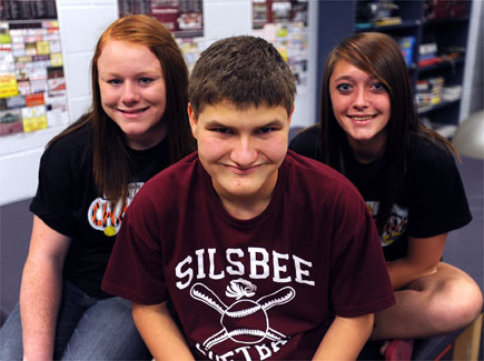 Student with autism gains letter jacket with softball team's help