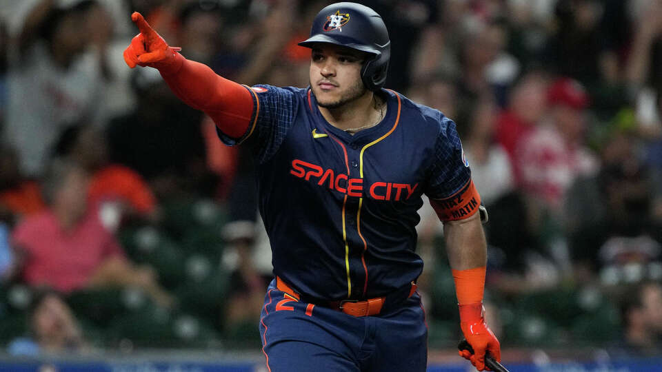 Houston Astros catcher Yainer Diaz (21) celebrates after he hit a two-run home run during the eighth inning of an MLB game Monday, June 3, 2024, at Minute Maid Park in Houston.