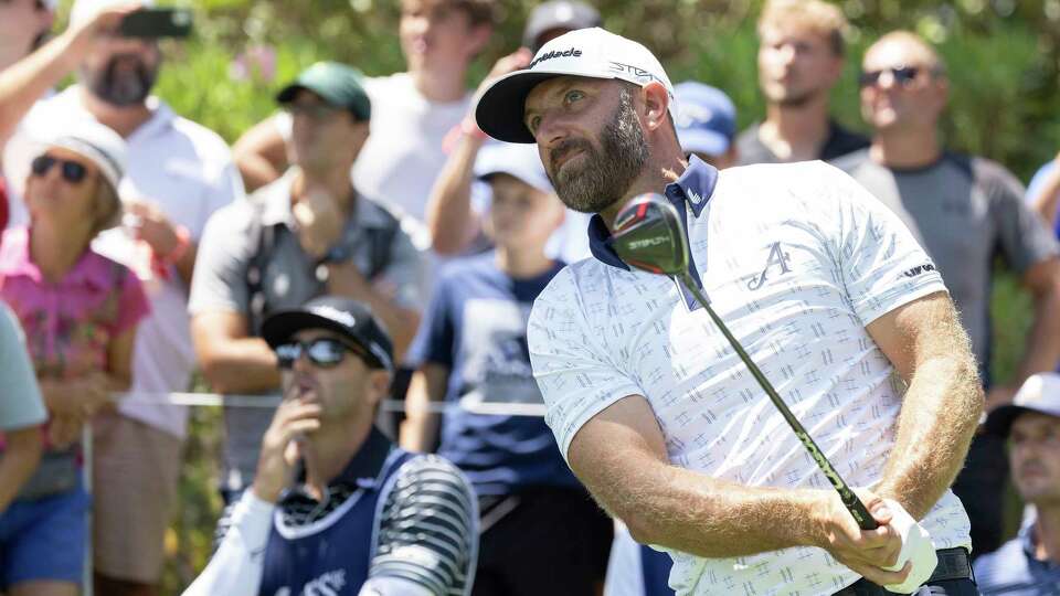 Captain Dustin Johnson of 4Aces GC hits his shot from the fifth tee during the first round of LIV Golf Andalucía at the Real Club Valderrama on Friday, June 30, 2023 in San Roque, Spain. (Photo by Chris Trotman/LIV Golf via AP)