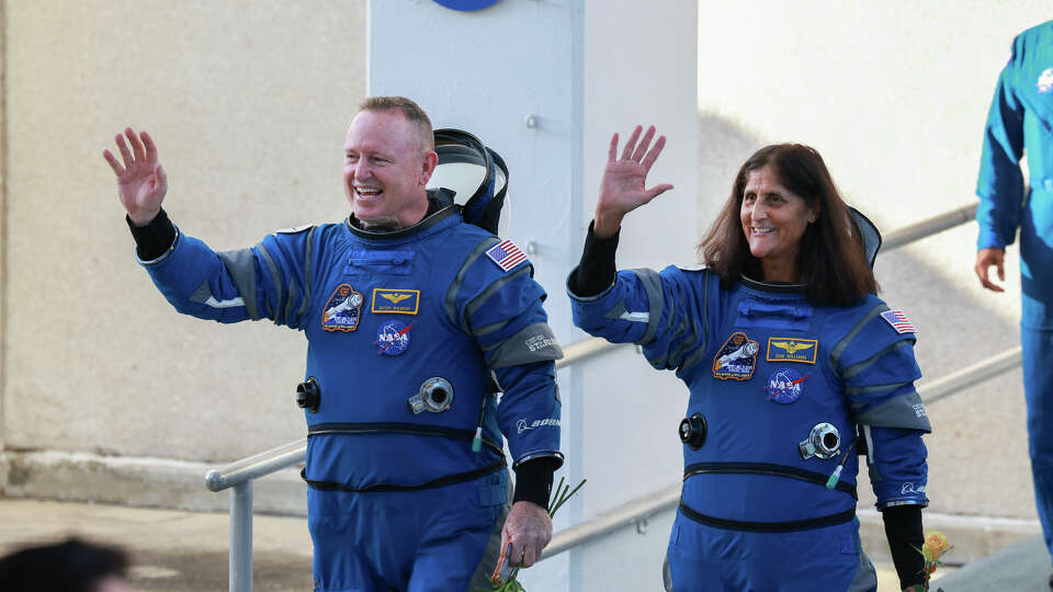 NASA's Boeing Crew Flight Test Commander Butch Wilmore (L) and Pilot Suni Williams walk out of the Operations and Checkout Building on June 05, 2024 in Cape Canaveral, Florida. The astronauts are heading to Boeing's Starliner spacecraft, which sits atop a United Launch Alliance Atlas V rocket, for NASA's Boeing Crew Flight Test to the International Space Station. (Photo by Joe Raedle/Getty Images)