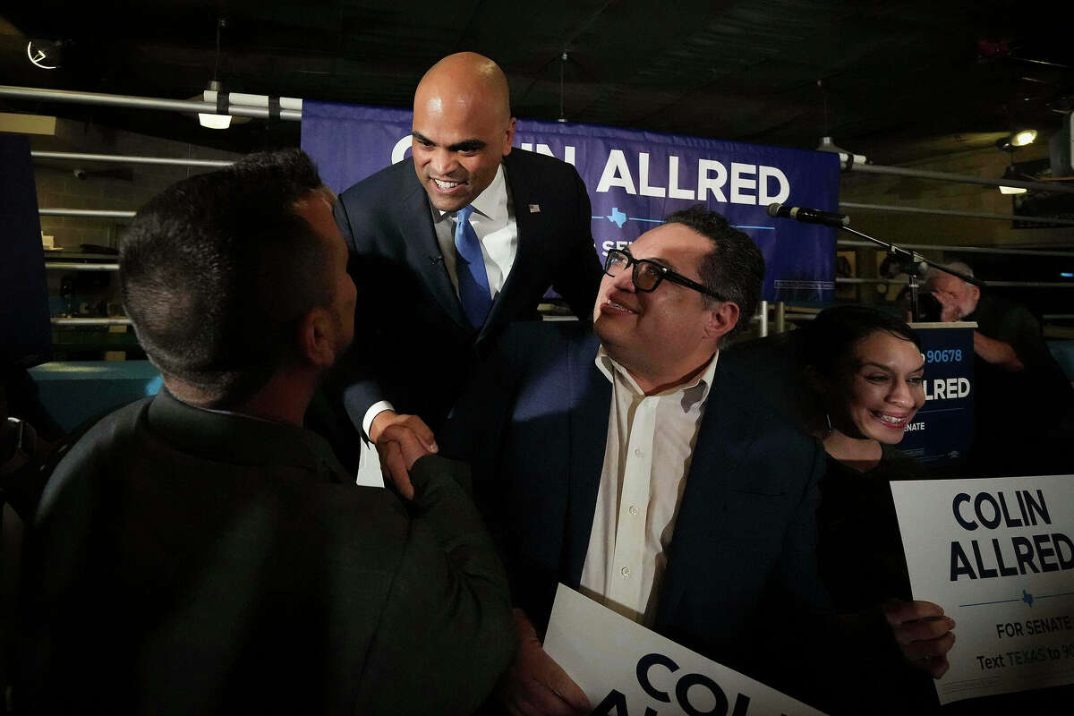 Democrat Colin Allred, a U.S. Senate candidate, greets supporters, including Dallas City Council members Adam Bazaldua, left, and Omar Narvaez during a primary election watch party, March 5, 2024, in Dallas. (Smiley N. Pool/The Dallas Morning News/TNS)