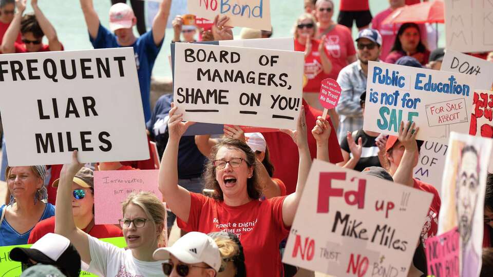Jennifer Mathieu an English teacher at Bellaire High School, participates in a protest against Houston Independent School District Superintendent Mike Miles on Saturday, May 25, 2024, at Houston City Hall in Houston. The protest drew hundreds to march in downton Houston.