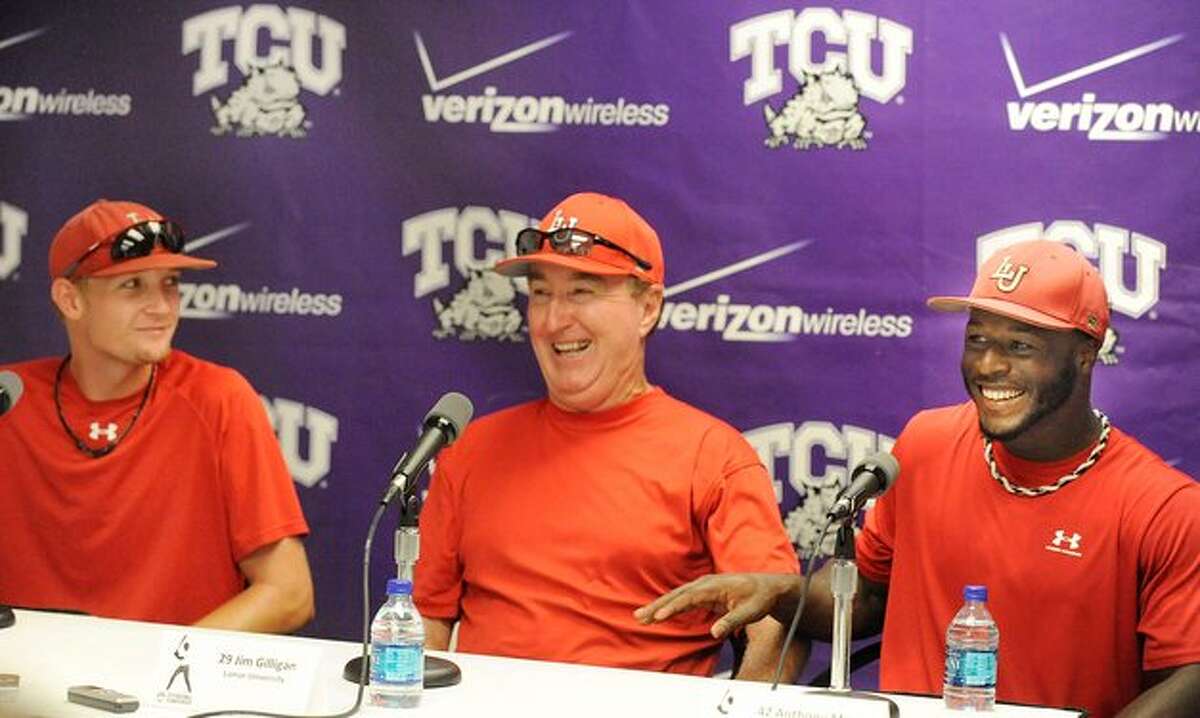 Lamar head coach Jim Gilligan, center, and players, Matison Smith, left, and Anthony Moore, right, share a moment of laughter during a press conference on Thursday afternoon at Texas Christian University's Lupton Stadium in Fort Worth. The Cardinals will play in Friday's NCAA tournament game against TCU at 7p.m. Valentino Mauricio/The Enterprise