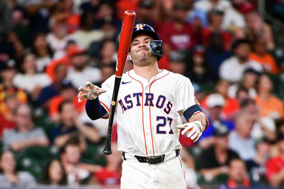 Jose Altuve #27 of the Houston Astros reacts after lining out to third base in the second inning against the St. Louis Cardinals at Minute Maid Park on June 04, 2024 in Houston, Texas. 