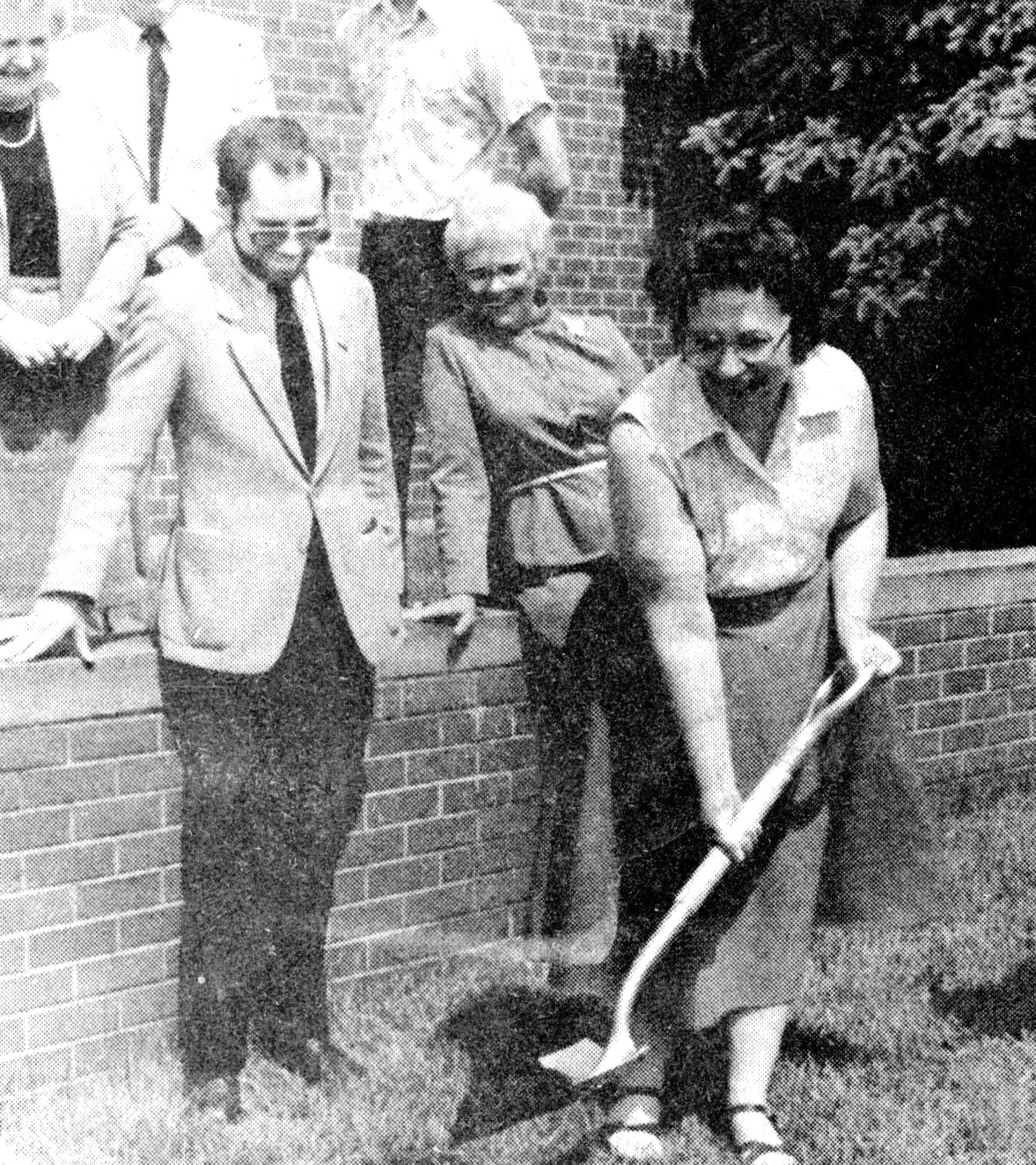 Onekama teens plant petunias along M22