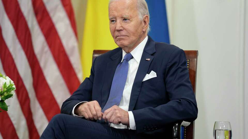 U.S. President Joe Biden looks on as he meets with Ukrainian President Volodymyr Zelenskyy in Paris, Friday, June 7, 2024.