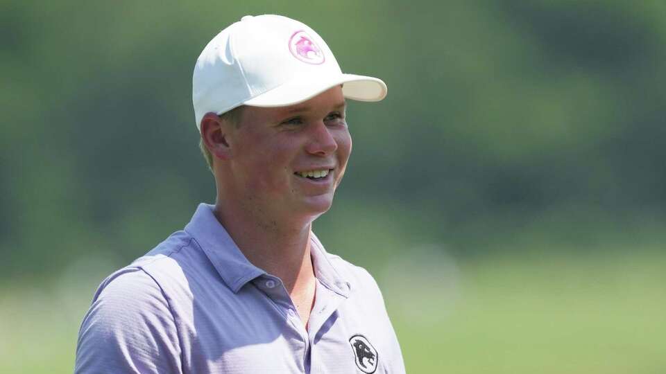 Caleb Surratt smiles after hitting a par on the 18th hole during the LIV Golf Houston tournament at Golf Club of Houston on Friday, June 7, 2024 in Humble. Surratt ended the day at 7 below par.