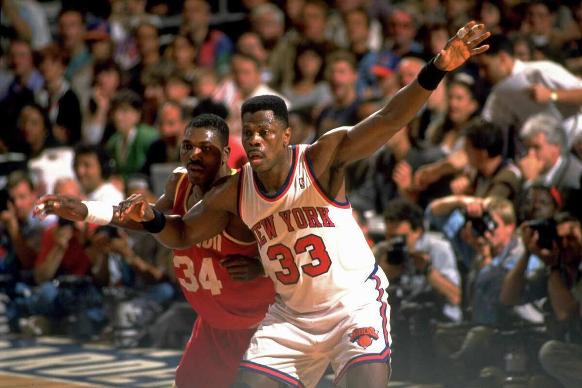 New York Knicks Patrick Ewing (33) in action vs Houston Rockets Hakeem Olajuwon (34) at Madison Square Garden. Game 3. New York, NY 6/12/1994 