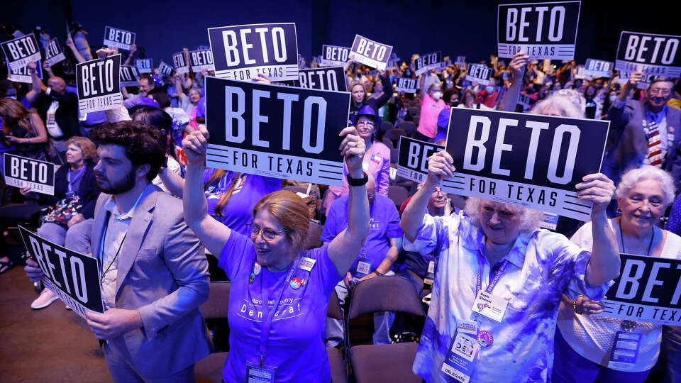 Delegates and guests cheers on Democratic gubernatorial challenger Beto O'Rourke as he delivers his speech during the 2022 Texas Democratic Convention general session at the Kay Bailey Hutchison Convention Center in Dallas, July 15, 2022.