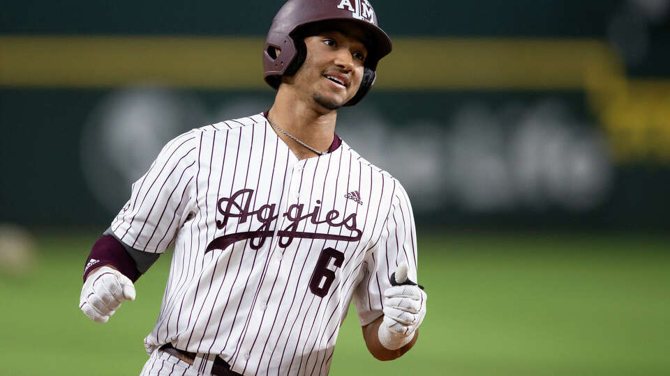 ARLINGTON, TX - MARCH 01: Braden Montgomery #6 of the Texas A&M Aggies smiles after hitting a three-run home run in the first inning during a game against the Arizona State Sun Devils at the Kubota College Baseball Series at Globe Life Field on March 1, 2024 in Arlington, Texas. (Photo by Kate Woolson/Texas Rangers/Getty Images)