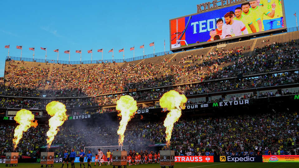 Teams take the field for pregame introductions prior to an international soccer friendly match between Mexico and Brazil, Saturday, June 8, 2024, at Texas A&M's Kyle Field in College Station, Texas. (AP Photo/Julio Cortez)