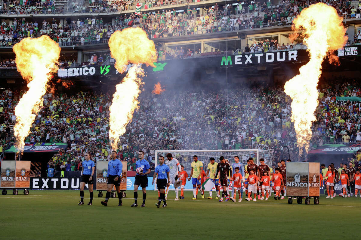 Teams take the field during an international friendly between Mexico and Brazil at Kyle Field on June 08, 2024 in College Station, Texas.