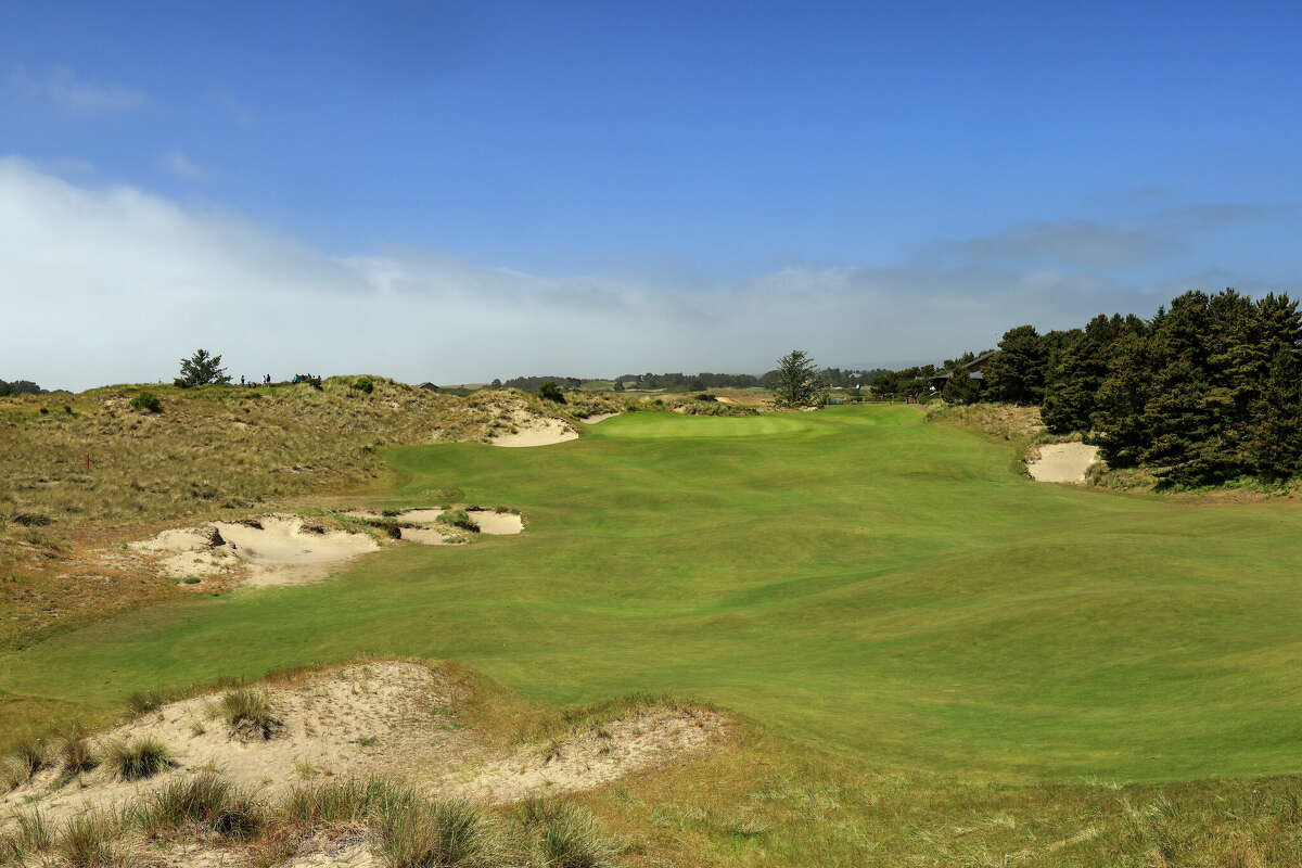 A view of the second shot on the 42-yard par 4, 18th hole on The Bandon Trails Course, which was designed by Bill Coore and Ben Crenshaw, at The Bandon Dunes Golf Resort in Oregon. The team behind this course will be bringing a resort to East Texas.