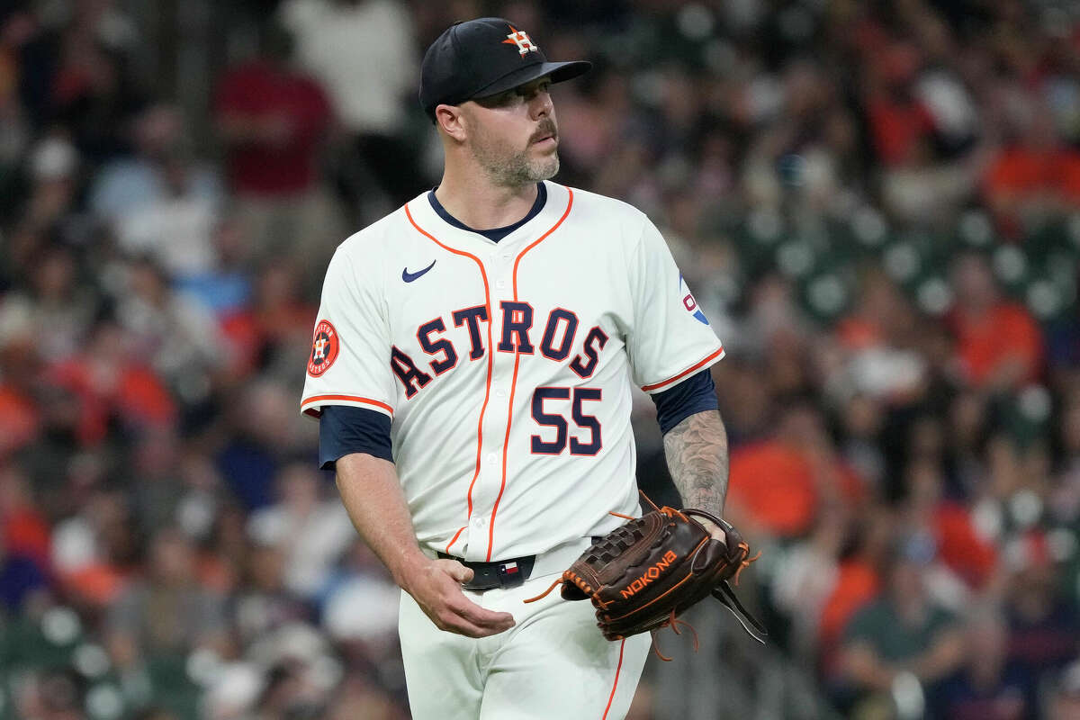 Houston Astros relief pitcher Ryan Pressly (55) reacts after Oakland Athletics Brent Rooker's RBI single tying the game during the eighth inning of an MLB baseball game at Minute Maid Park on Tuesday, May 14, 2024, in Houston.