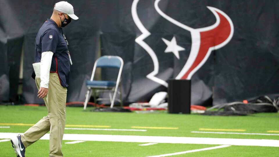 Houston Texans head coach Bill O'Brien walks off the field as the clock winds down during the fourth quarter of an NFL football game against the Minnesota Vikings at NRG Stadium on Sunday, Oct. 4, 2020, in Houston. The Vikings beat the Texans 31-23, to drop the Texans to 0-4 on the season.